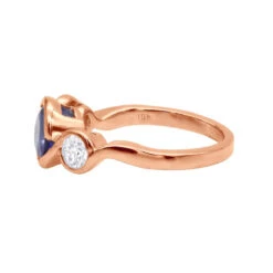 Unique Round Cut Tanzanite And Diamond Engagement Ring 18K White Gold 13 Unique Round Cut Tanzanite And Diamond Engagement Ring 18K White Gold -Luxurman channel set round cut tanzanite and diamond engagement ring 18k gold backro