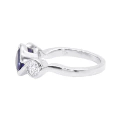 Unique Round Cut Tanzanite And Diamond Engagement Ring 18K White Gold 11 Unique Round Cut Tanzanite And Diamond Engagement Ring 18K White Gold -Luxurman channel set round cut tanzanite and diamond engagement ring 18k gold backwh